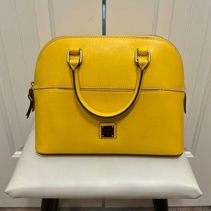 Yellow Dooney & Bourke purse. New with tags! Never worn.